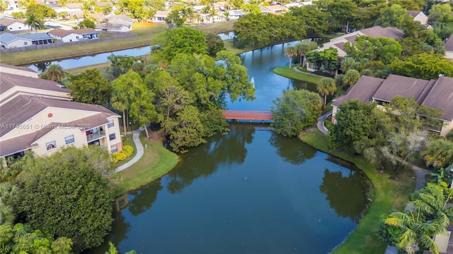 aerial view featuring a water view and a residential view