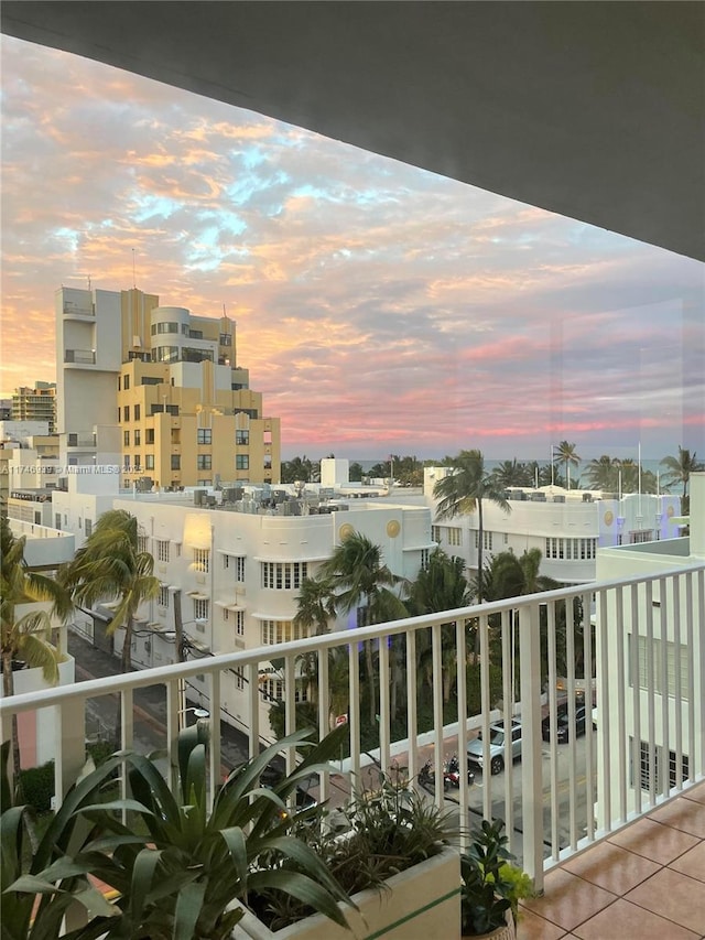 view of balcony at dusk