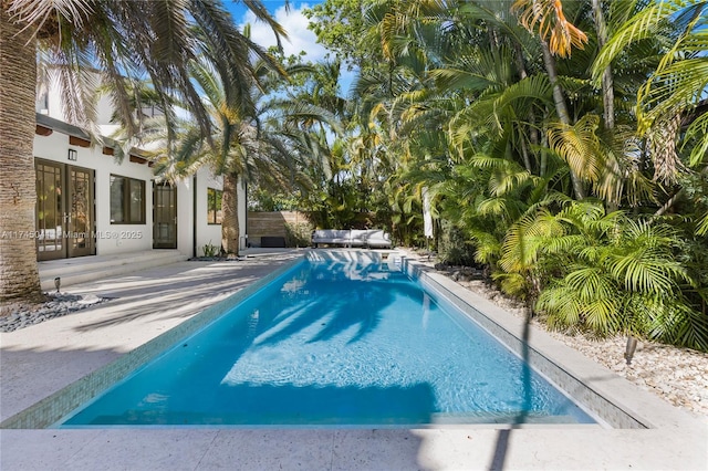 view of pool with a patio area