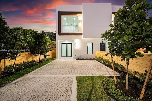 modern home featuring a patio