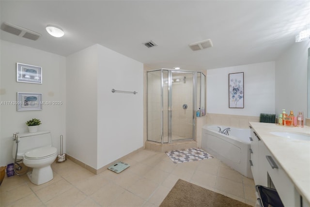 full bathroom with tile patterned floors, toilet, vanity, and independent shower and bath