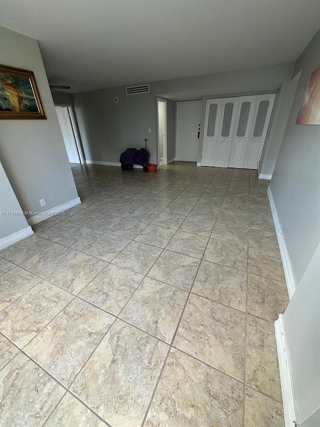17011 N Bay Rd Unit 507, Sunny Isles Beach, FL 33160 - unfurnished living room with baseboards