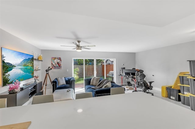 carpeted bedroom featuring ceiling fan and access to exterior