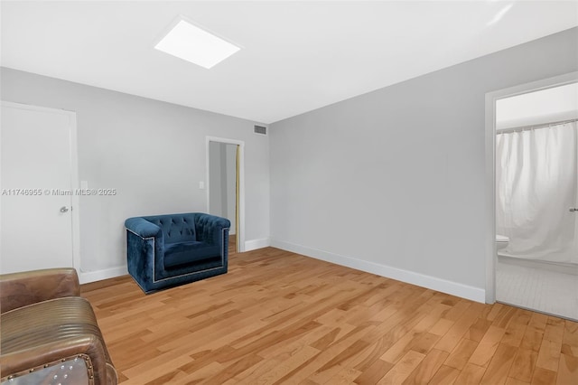 living area featuring hardwood / wood-style flooring