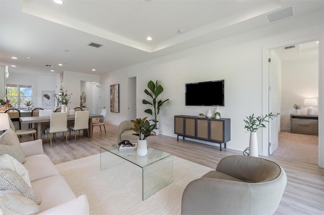 11539 SW Visconti Way, Port St Lucie, FL 34986 - living area with light wood-style flooring, recessed lighting, and baseboards