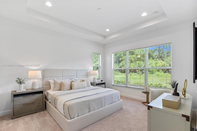 11539 SW Visconti Way, Port St Lucie, FL 34986 - bedroom featuring a raised ceiling, recessed lighting, light carpet, and baseboards