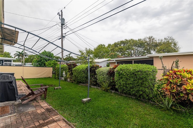 2713 NW 53rd St, Tamarac, FL 33309 - view of yard with a patio area