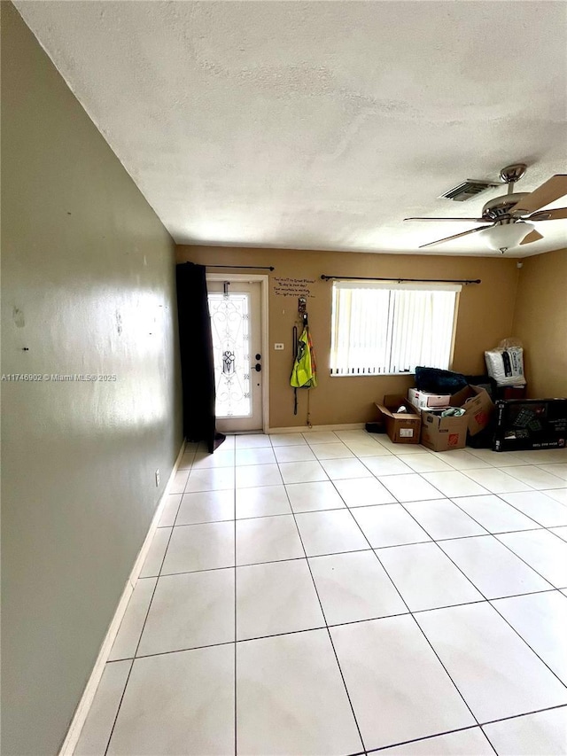 2713 NW 53rd St, Tamarac, FL 33309 - entryway with a textured ceiling, plenty of natural light, and visible vents