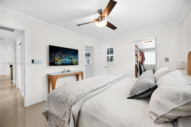 bedroom with ornamental molding, visible vents, and baseboards