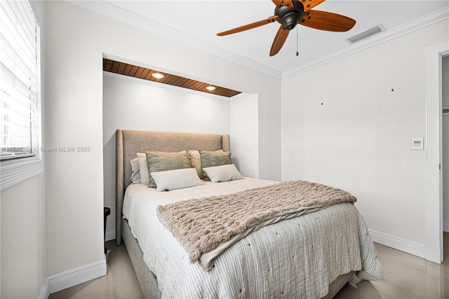 bedroom with baseboards, visible vents, a ceiling fan, and ornamental molding