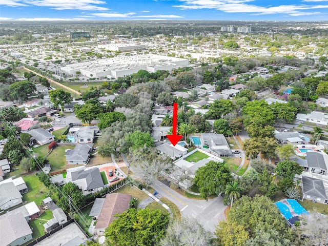 birds eye view of property with a residential view