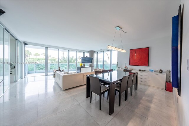 dining room featuring a wall of windows