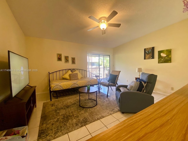 7128 Ashmont Cir Unit 207, Tamarac, FL 33321 - tiled living room featuring ceiling fan, lofted ceiling, and a textured ceiling