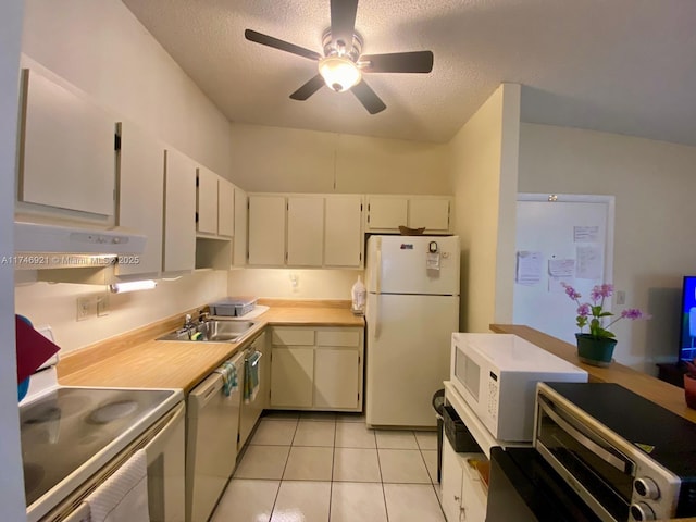 7128 Ashmont Cir Unit 207, Tamarac, FL 33321 - kitchen featuring white appliances, under cabinet range hood, ceiling fan, a textured ceiling, and light tile patterned floors