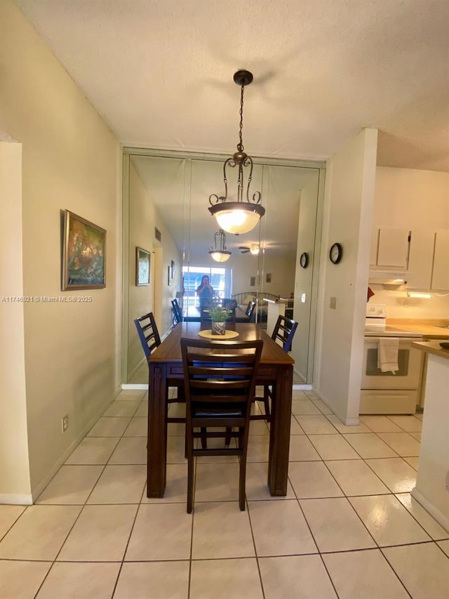 7128 Ashmont Cir Unit 207, Tamarac, FL 33321 - dining room with light tile patterned floors