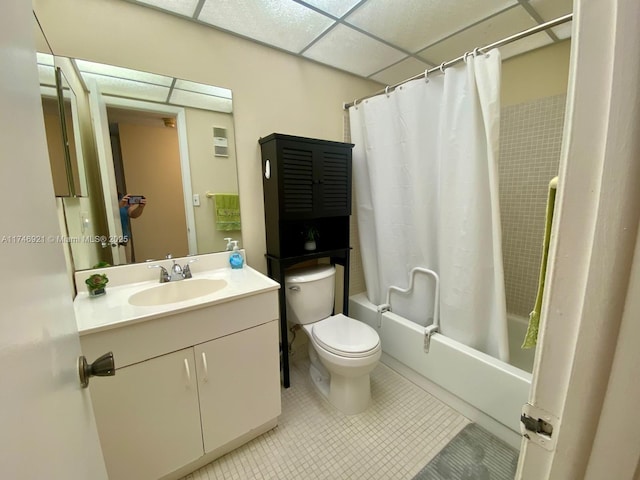 7128 Ashmont Cir Unit 207, Tamarac, FL 33321 - bathroom featuring shower / tub combo with curtain, vanity, tile patterned floors, and a drop ceiling