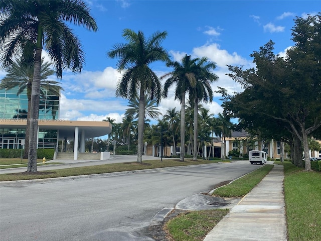 7128 Ashmont Cir Unit 207, Tamarac, FL 33321 - view of asphalt street featuring sidewalks and curbs
