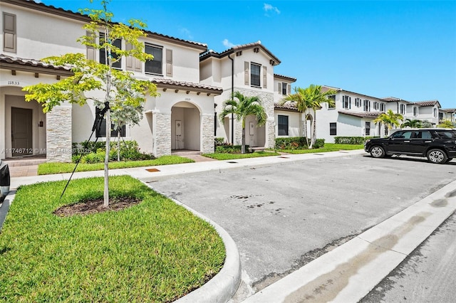 view of front facade with a front lawn