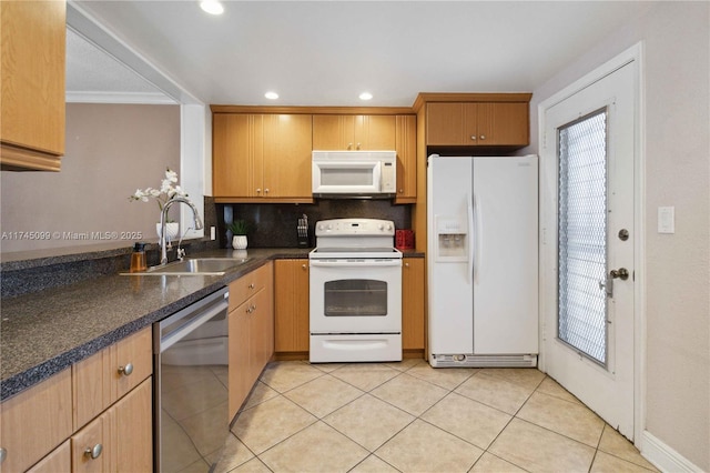 301 NE 14th Ave Unit 201, Hallandale Beach, FL 33009 - kitchen featuring white appliances, a sink, tasteful backsplash, dark countertops, and light tile patterned floors