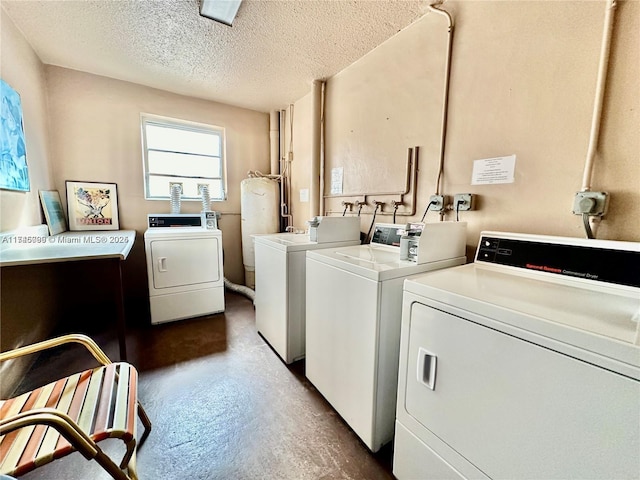 301 NE 14th Ave Unit 201, Hallandale Beach, FL 33009 - community laundry featuring separate washer and dryer and a textured ceiling