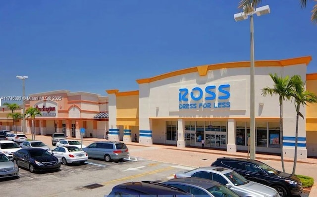 301 NE 14th Ave Unit 201, Hallandale Beach, FL 33009 - view of commercial property featuring uncovered parking