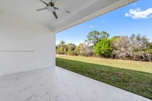 view of patio with ceiling fan