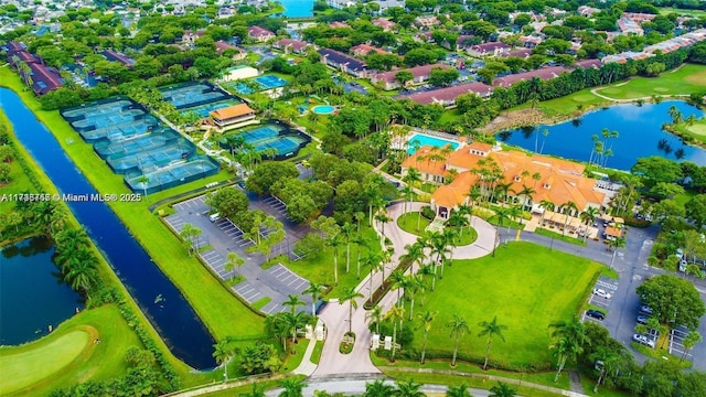 birds eye view of property featuring a water view