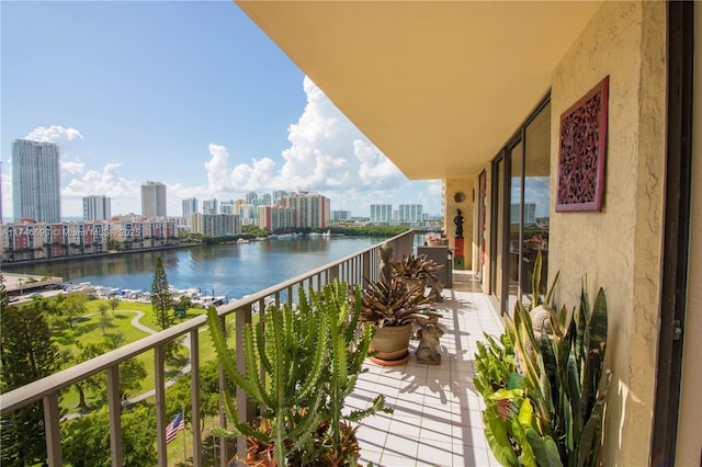 balcony featuring a water view