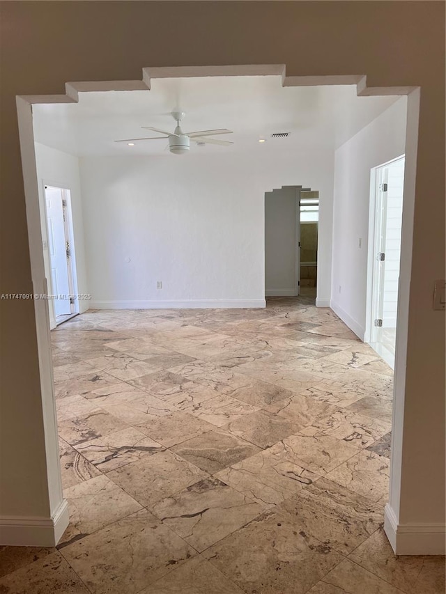 spare room featuring ceiling fan