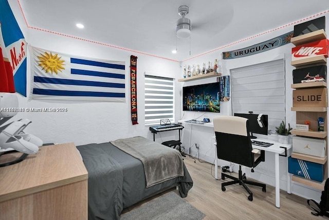 bedroom featuring light wood-type flooring