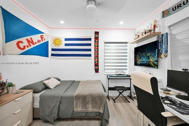 bedroom featuring light hardwood / wood-style flooring