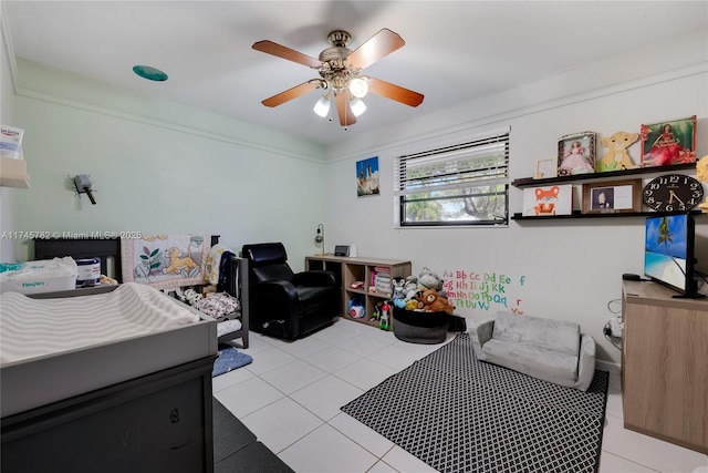 interior space featuring ceiling fan and light tile patterned floors