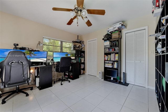 tiled office space with ceiling fan
