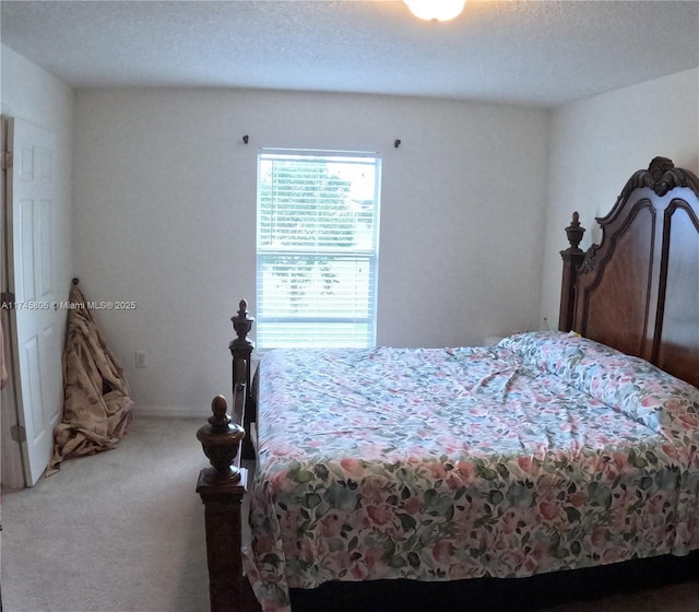 bedroom featuring carpet flooring