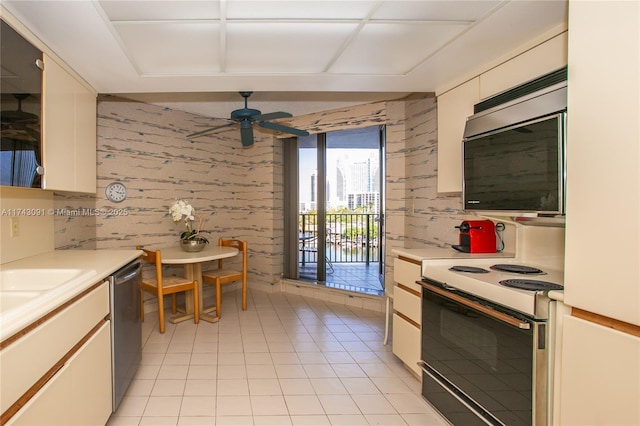 kitchen featuring white cabinets, electric stove, ceiling fan, light countertops, and stainless steel dishwasher