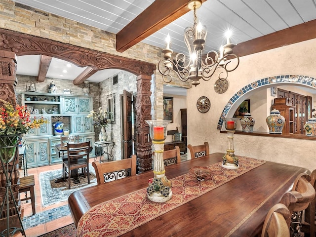 6200 SW 112th St, Pinecrest, FL 33156 - dining space featuring beamed ceiling, a chandelier, and a textured wall