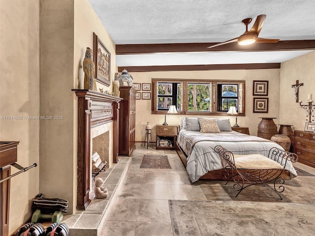 6200 SW 112th St, Pinecrest, FL 33156 - bedroom with a tile fireplace and a textured ceiling