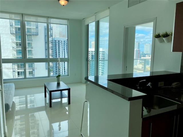 kitchen featuring light tile patterned flooring