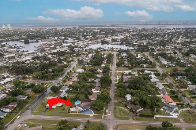 drone / aerial view with a water view