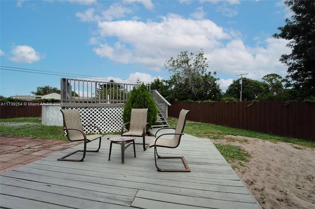 wooden terrace with fence and stairway