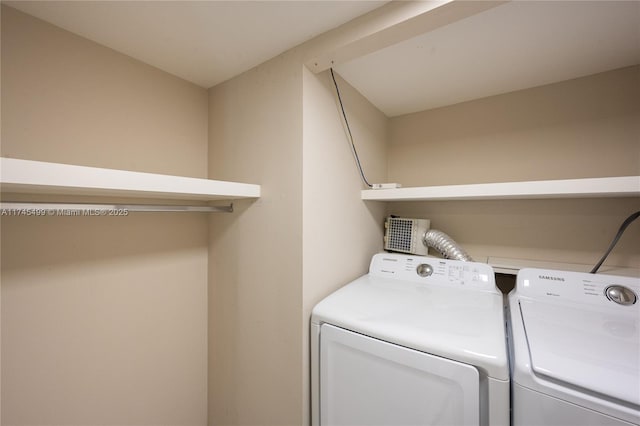 laundry area featuring separate washer and dryer