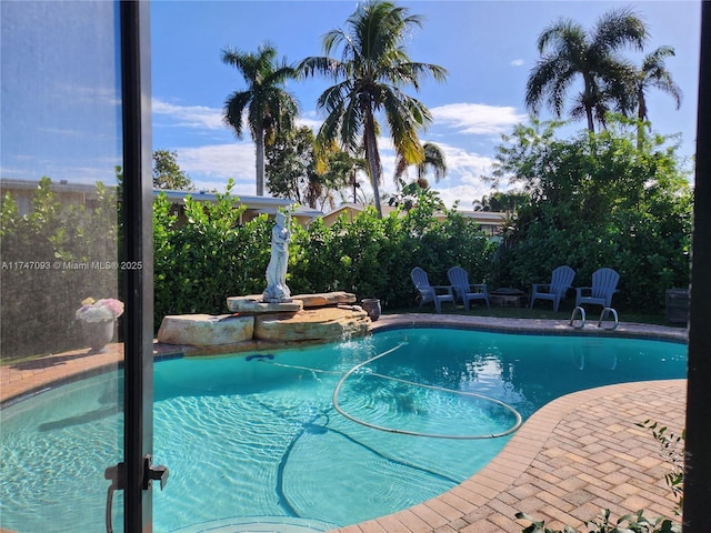 view of pool with a patio