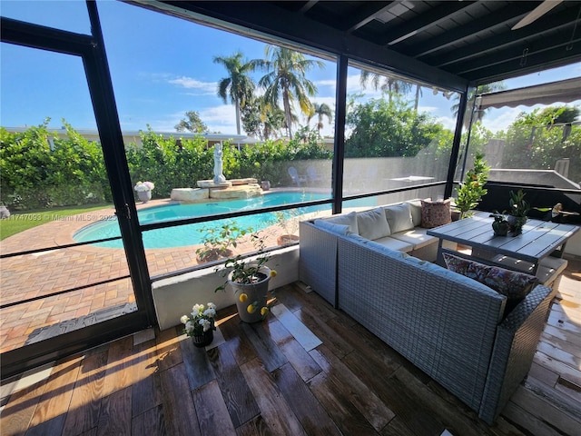 sunroom / solarium featuring plenty of natural light