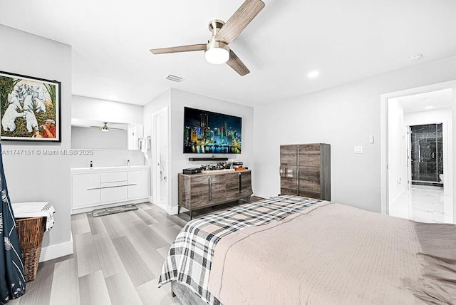 bedroom with a ceiling fan, visible vents, recessed lighting, wood finished floors, and baseboards