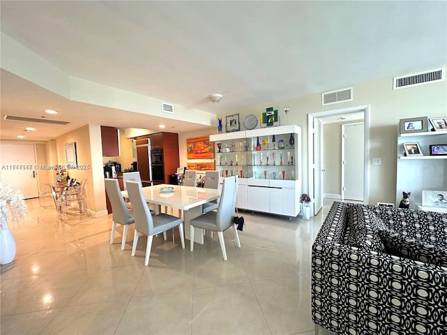 dining room with light tile patterned floors