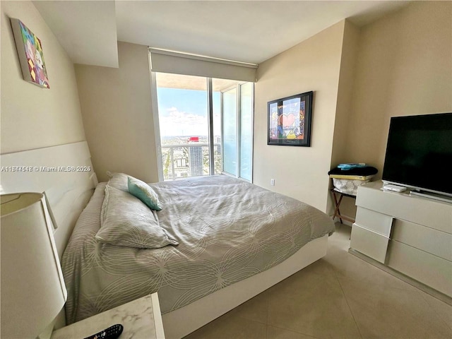 bedroom featuring light tile patterned flooring