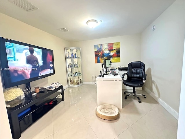 office area with light tile patterned flooring