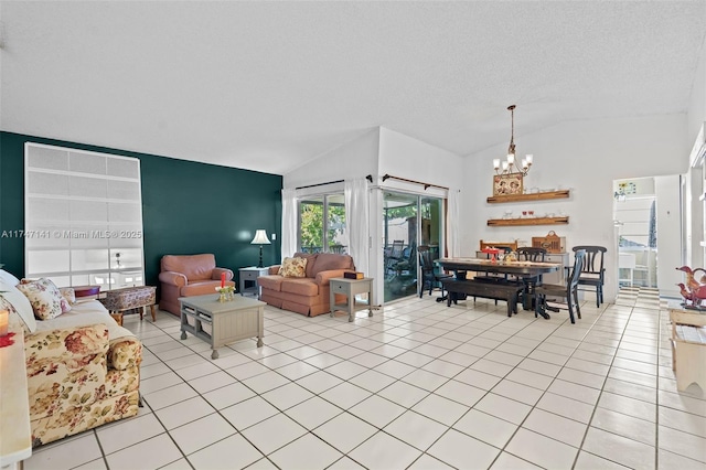 living room featuring light tile patterned floors, vaulted ceiling, an inviting chandelier, and a textured ceiling