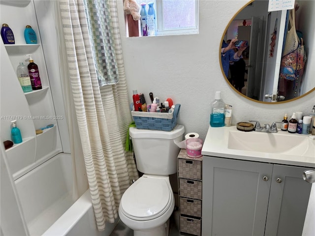 full bathroom featuring vanity, toilet, and shower / bath combo with shower curtain