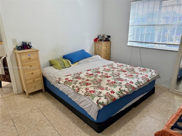 bedroom featuring tile patterned floors